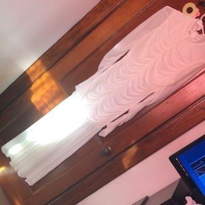 A long white dress with mesh.